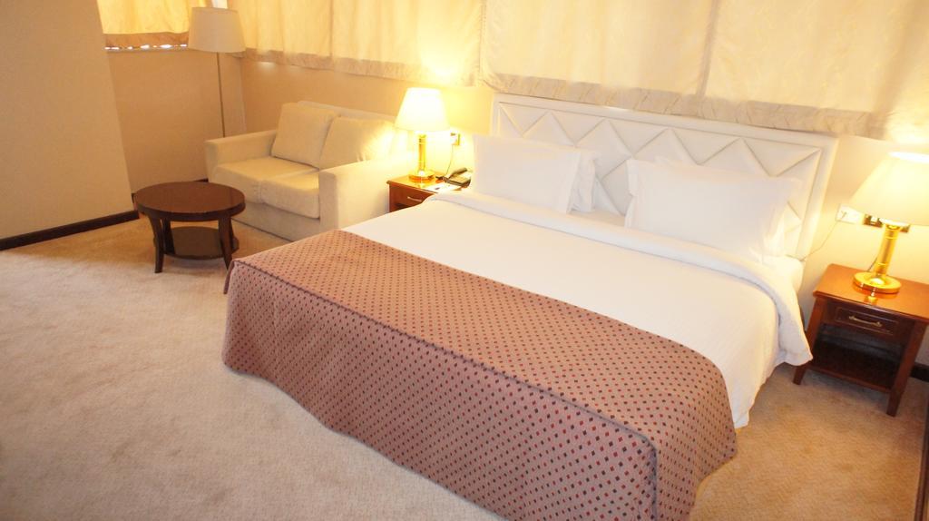 Gloria Hotel Doha Quarto foto