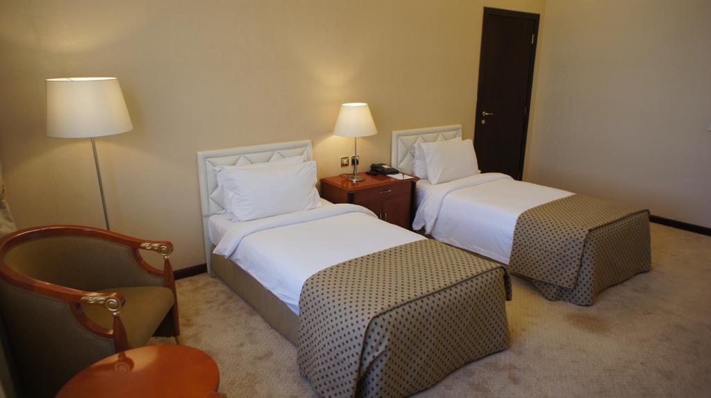 Gloria Hotel Doha Quarto foto