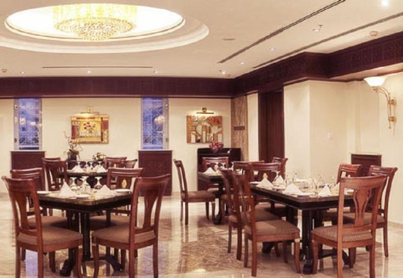 Gloria Hotel Doha Restaurante foto